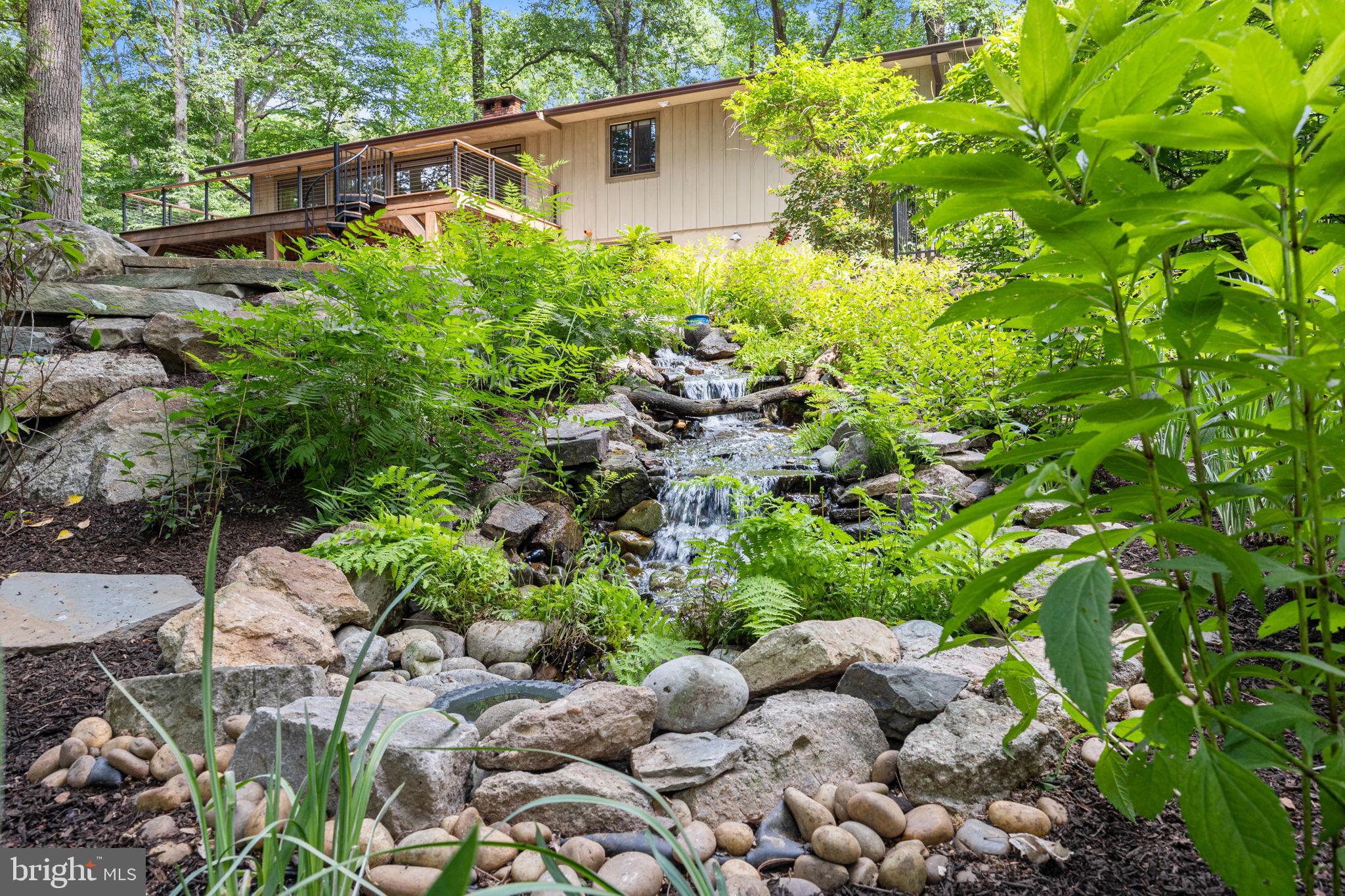 6975 Upper York Road New Hope, PA 18938 - Photo 51 of 61 Built-in stream ensures peaceful relaxation