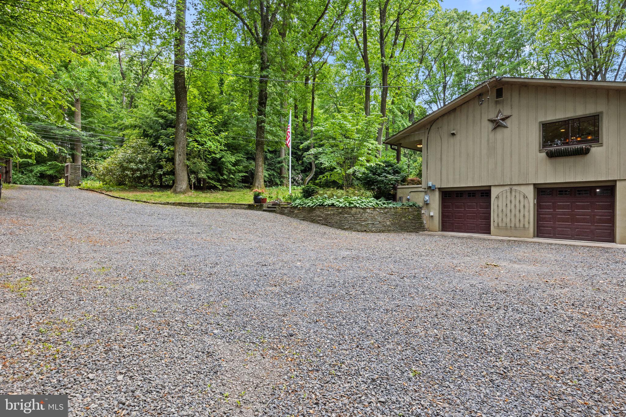 6975 Upper York Road New Hope, PA 18938 - Photo 54 of 61 Two-car garage with large driveway/parking area