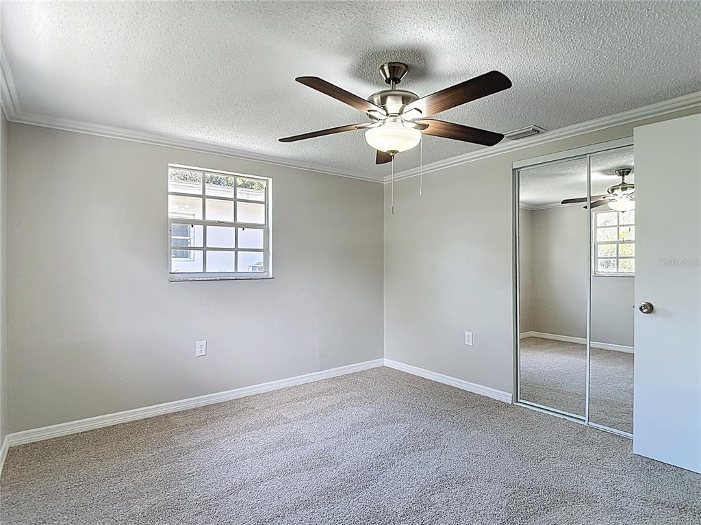 7827 Butler Avenue Hudson, FL 34667 - Photo 24 of 82 a view of an empty room with a window