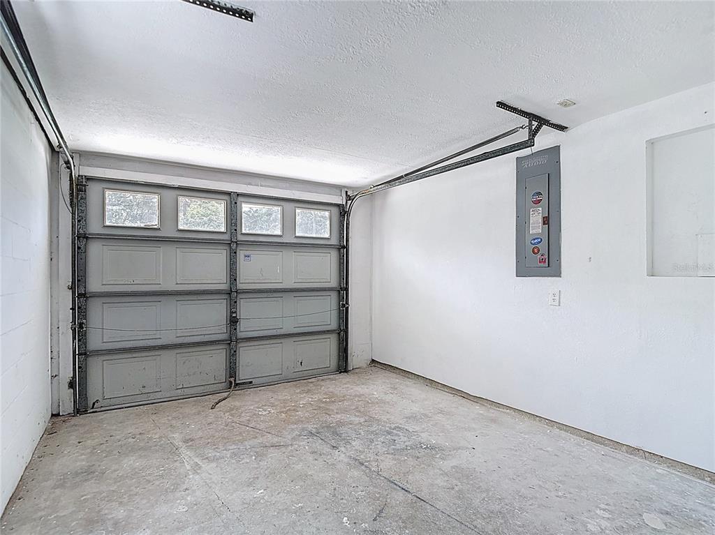 7827 Butler Avenue Hudson, FL 34667 - Photo 37 of 82 a view of an empty room with a window