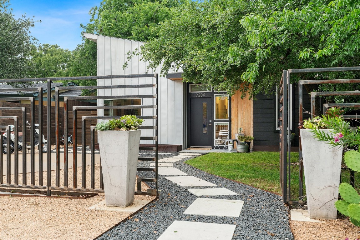 This modern east side property captures THE best of Austin's unique style & energy.