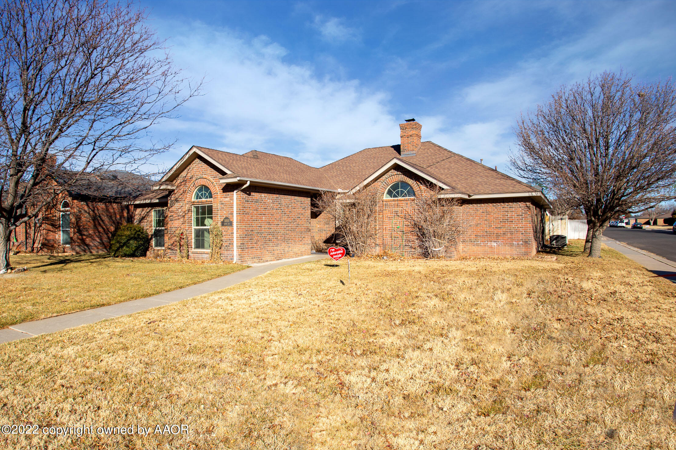 5000 Carmel Avenue Amarillo, TX 79110 - Photo 2 of 35 a front view of a house with a yard