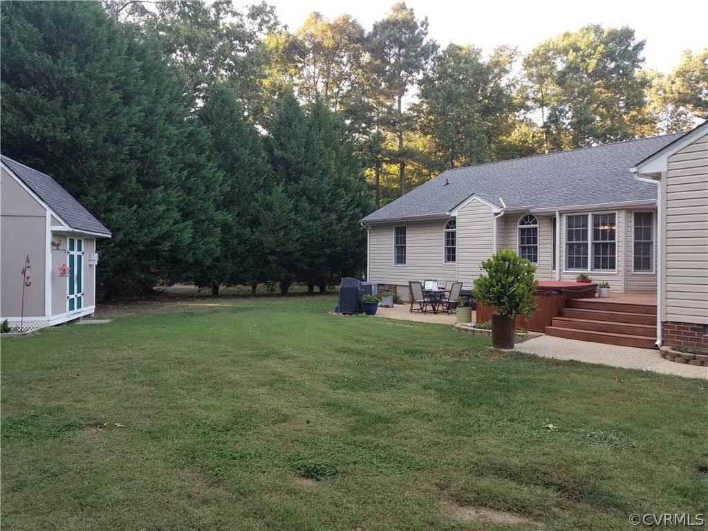2057 Mill Road Henrico, VA 23231 - Photo 8 of 44 a front view of house with yard and green space