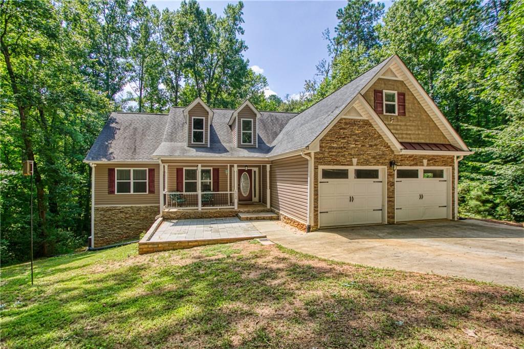 6068 Belle Meade Drive Villa Rica, GA 30180 - Photo 1 of 1 a front view of a house with a yard
