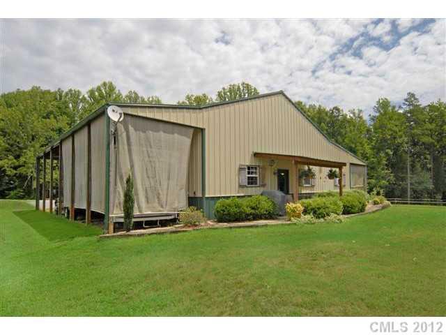 1139 State Rd S-46-27 Clover, SC 29710 - Photo 15 of 16 a view of a back yard of the house