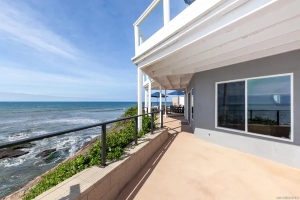 a view of balcony with furniture