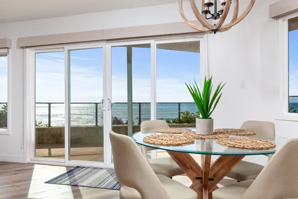 a kitchen with a stove a sink and a refrigerator