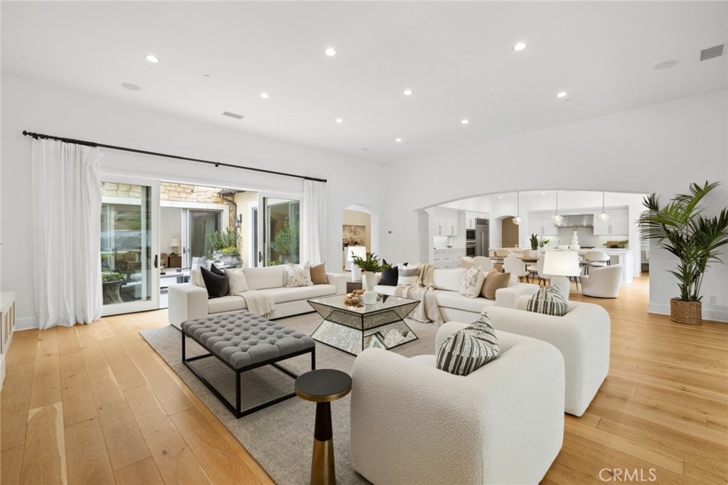 115 Treasure Irvine, CA 92602 - Photo 14 of 39 a living room with furniture and a large window