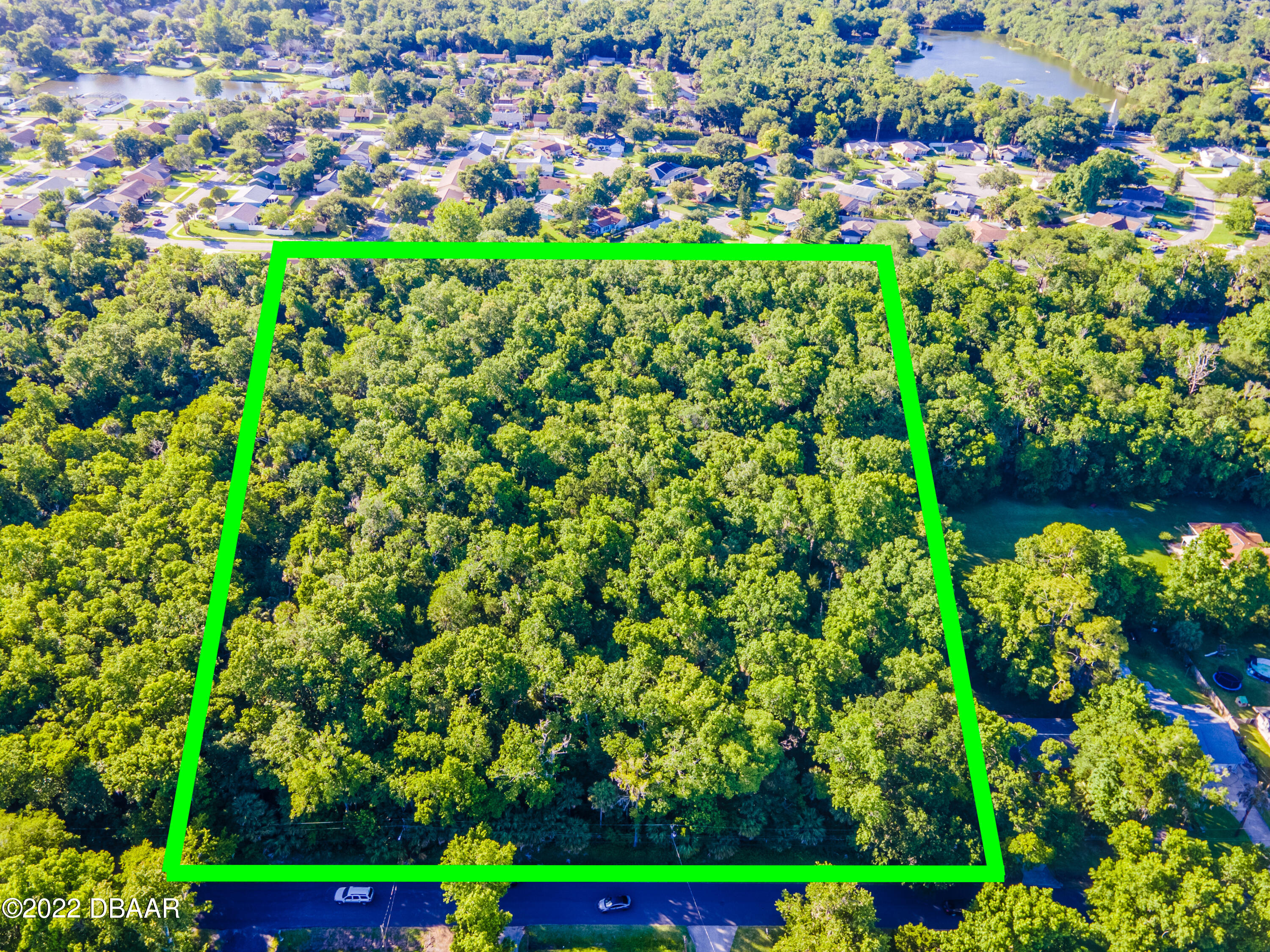 845 Arroyo Parkway Ormond Beach, FL 32174 - Photo 2 of 8 a view of a yard with plants