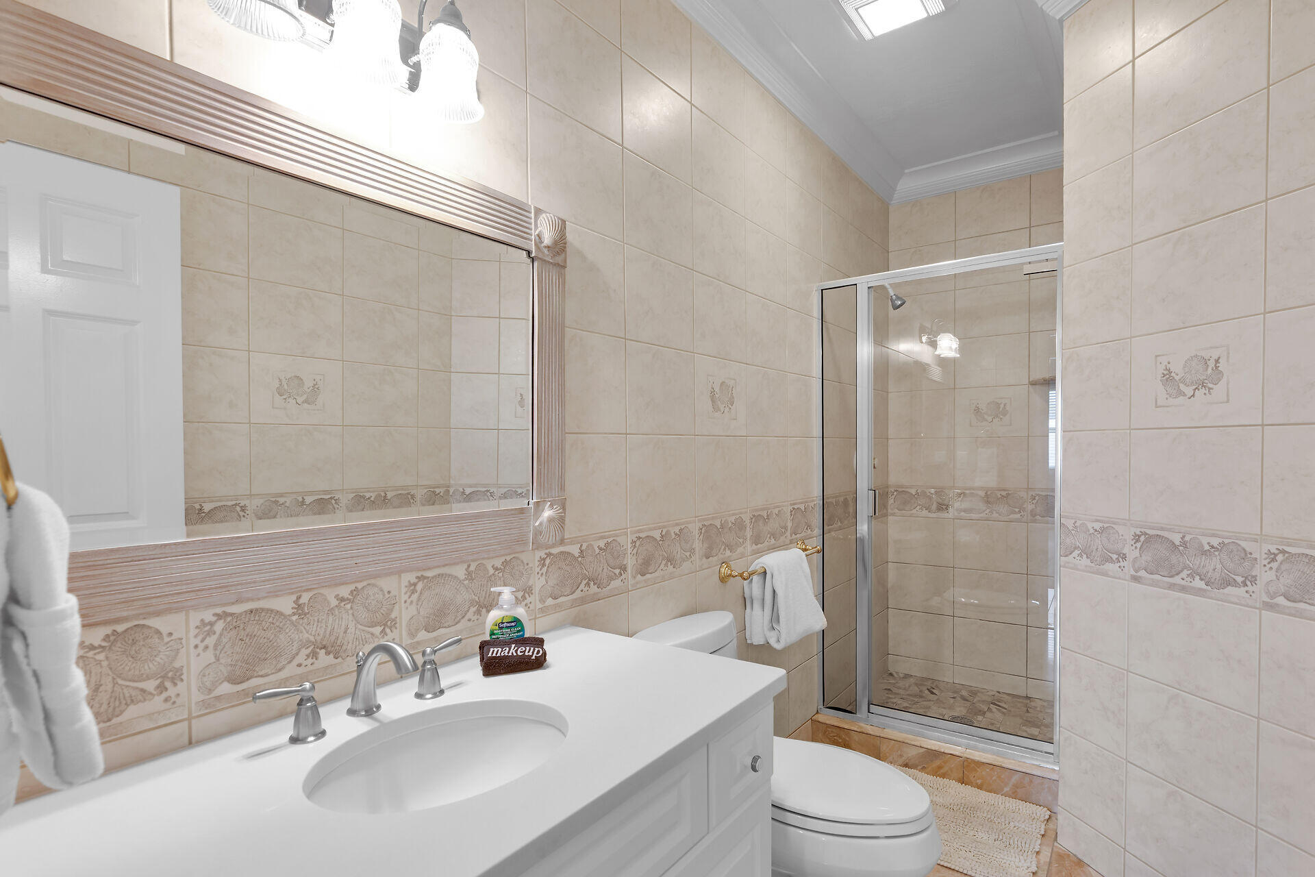 580-590 10th Street Key Colony Beach, FL 33051 - Photo 45 of 75 a bathroom with a sink a toilet and shower