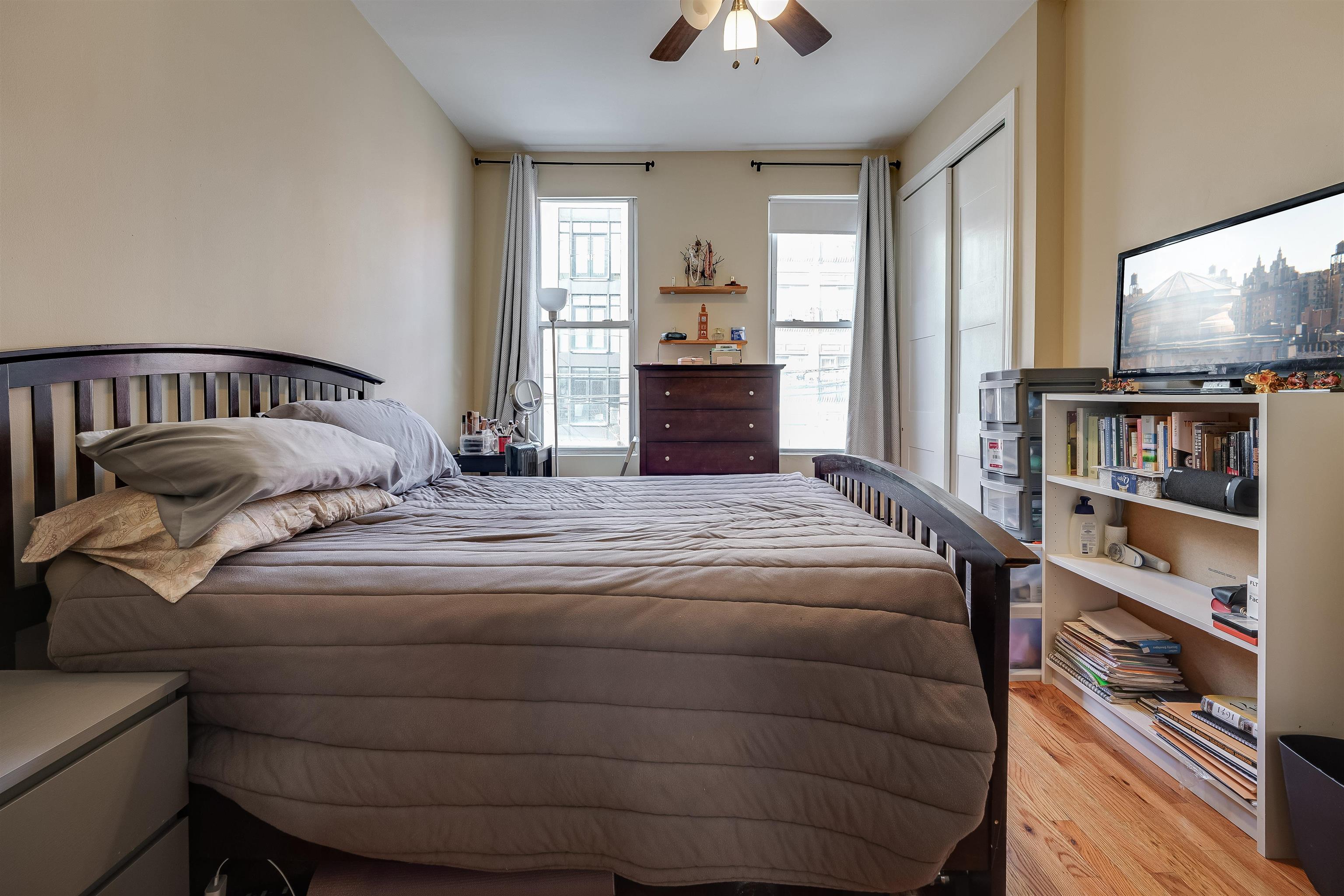 63 Madison Street, Unit 3 Hoboken, NJ 07030 - Photo 15 of 19 a bedroom with a bed and window