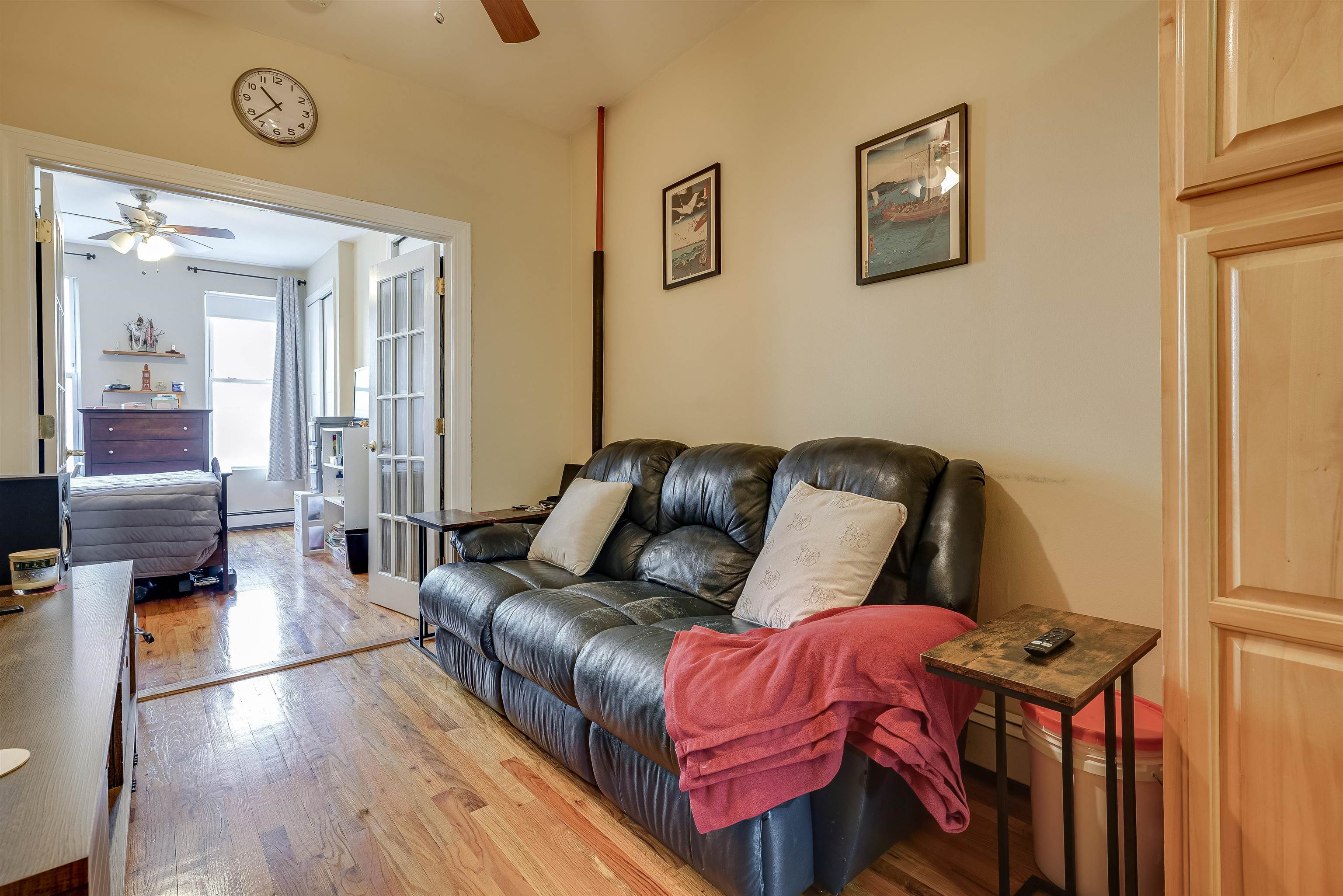 63 Madison Street, Unit 3 Hoboken, NJ 07030 - Photo 3 of 19 a living room with furniture and wooden floor
