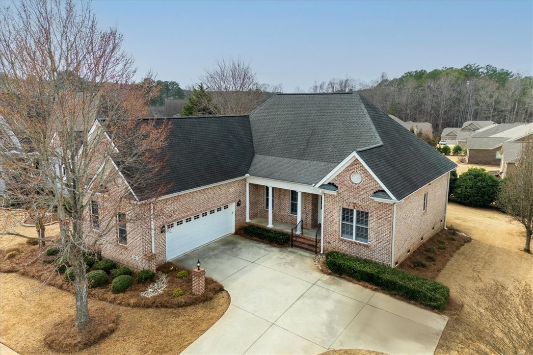 38 Angus Run Seneca, SC 29672 - Photo 40 of 46 This classic brick residence features a welcoming covered entrance and an attached garage.