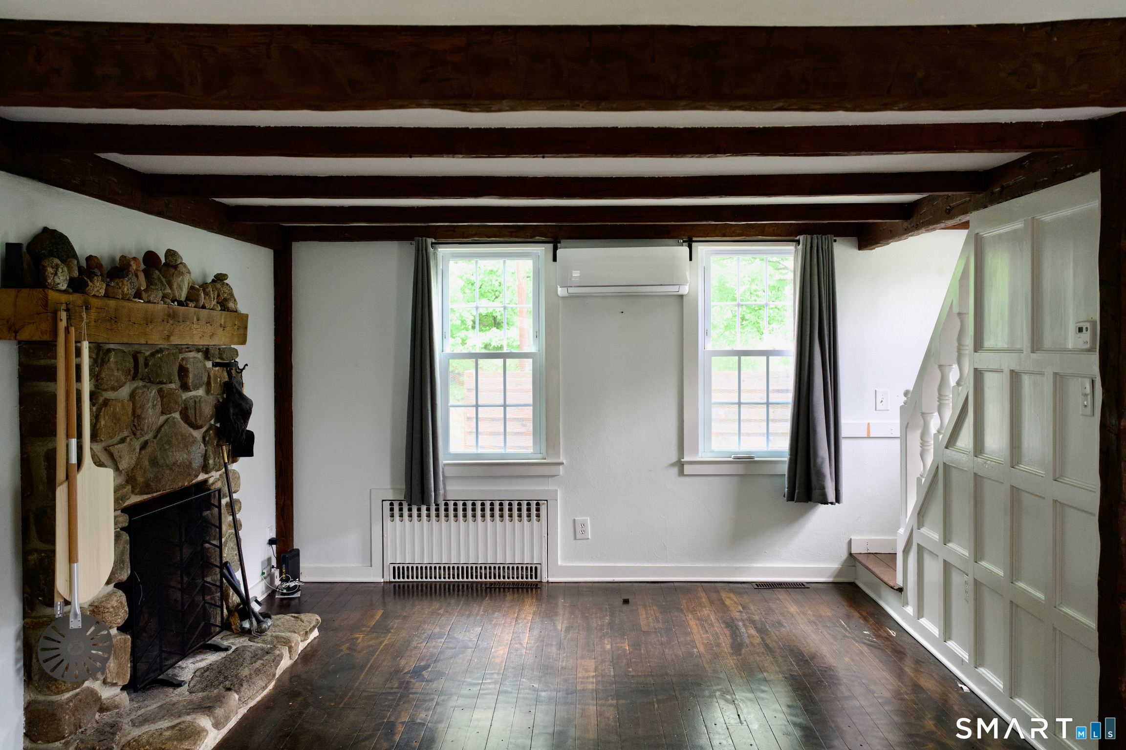 259 Peck Hill Road Woodbridge, CT 06525 - Photo 10 of 32 a view of empty room with wooden floor and fan