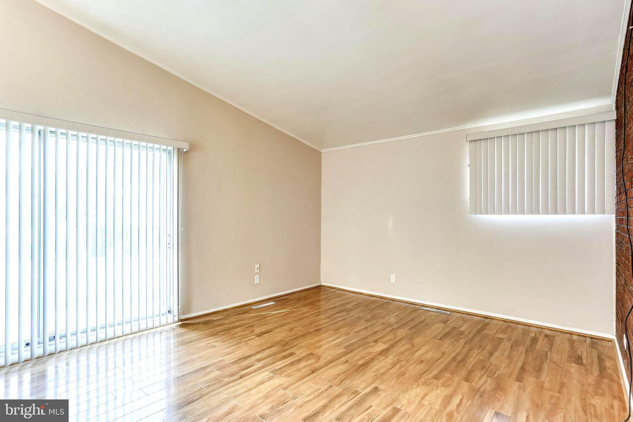 4729 Belle Forte Road Baltimore, MD 21208 - Photo 16 of 46 Bright, Sun Lit Living Room