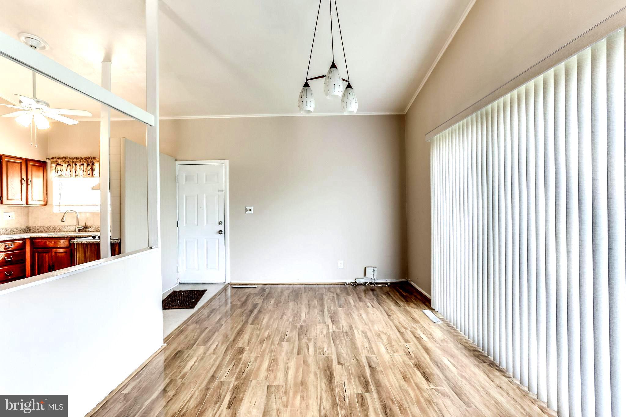 4729 Belle Forte Road Baltimore, MD 21208 - Photo 17 of 46 Dining Room with Laminate Flooring