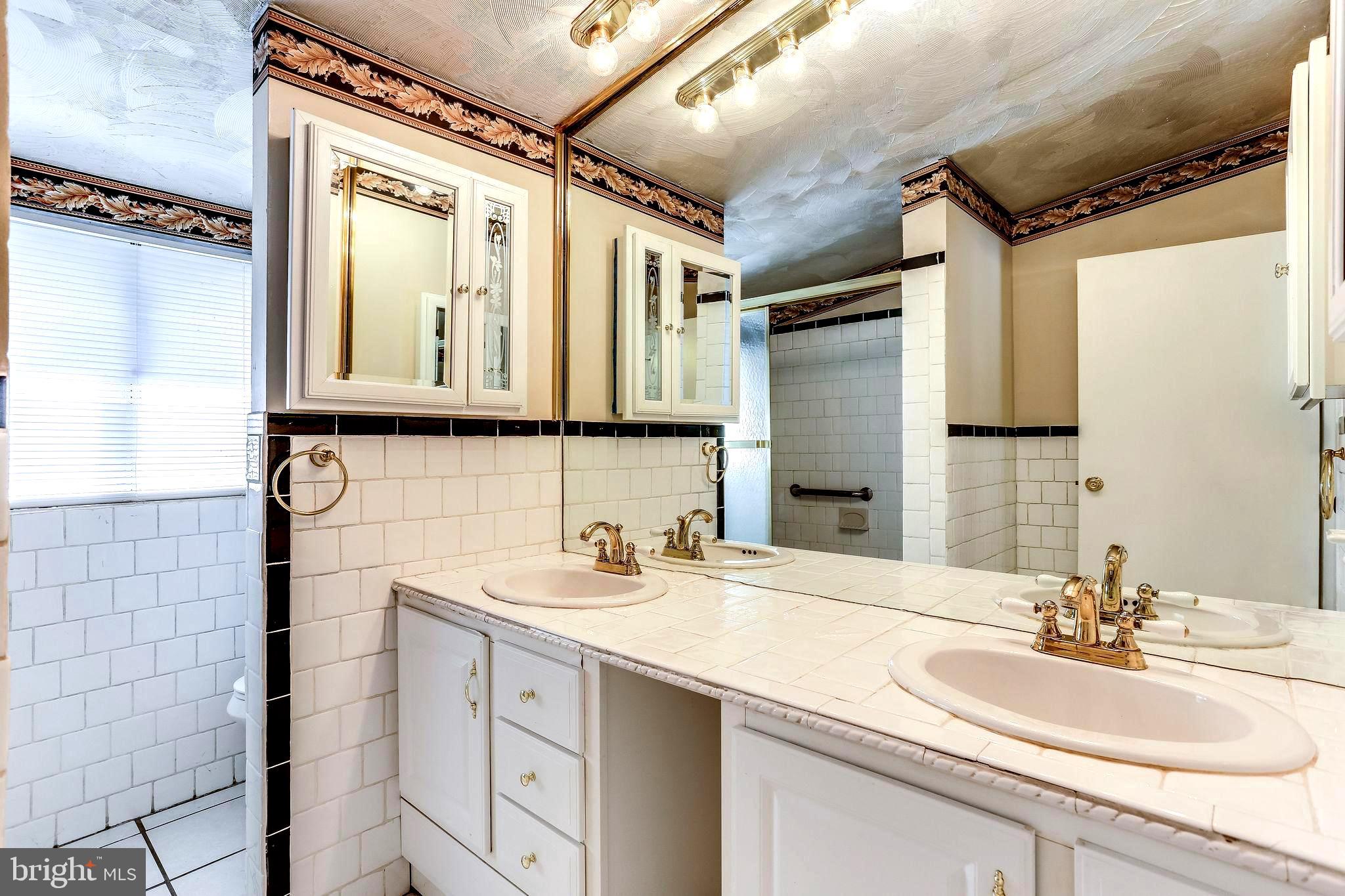 4729 Belle Forte Road Baltimore, MD 21208 - Photo 27 of 46 Updated Hall Bath with Double Bowl Vanity