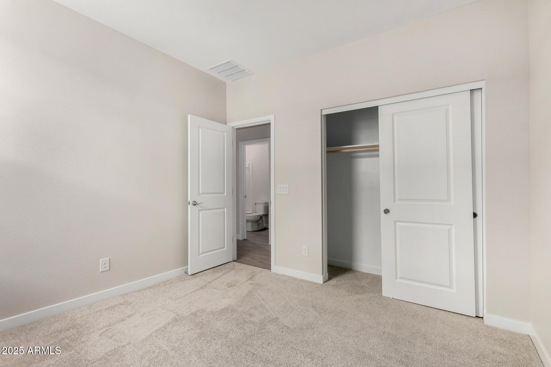 16977 West Spur Drive Surprise, AZ 85387 - Photo 18 of 30 a view of an empty room and closet area