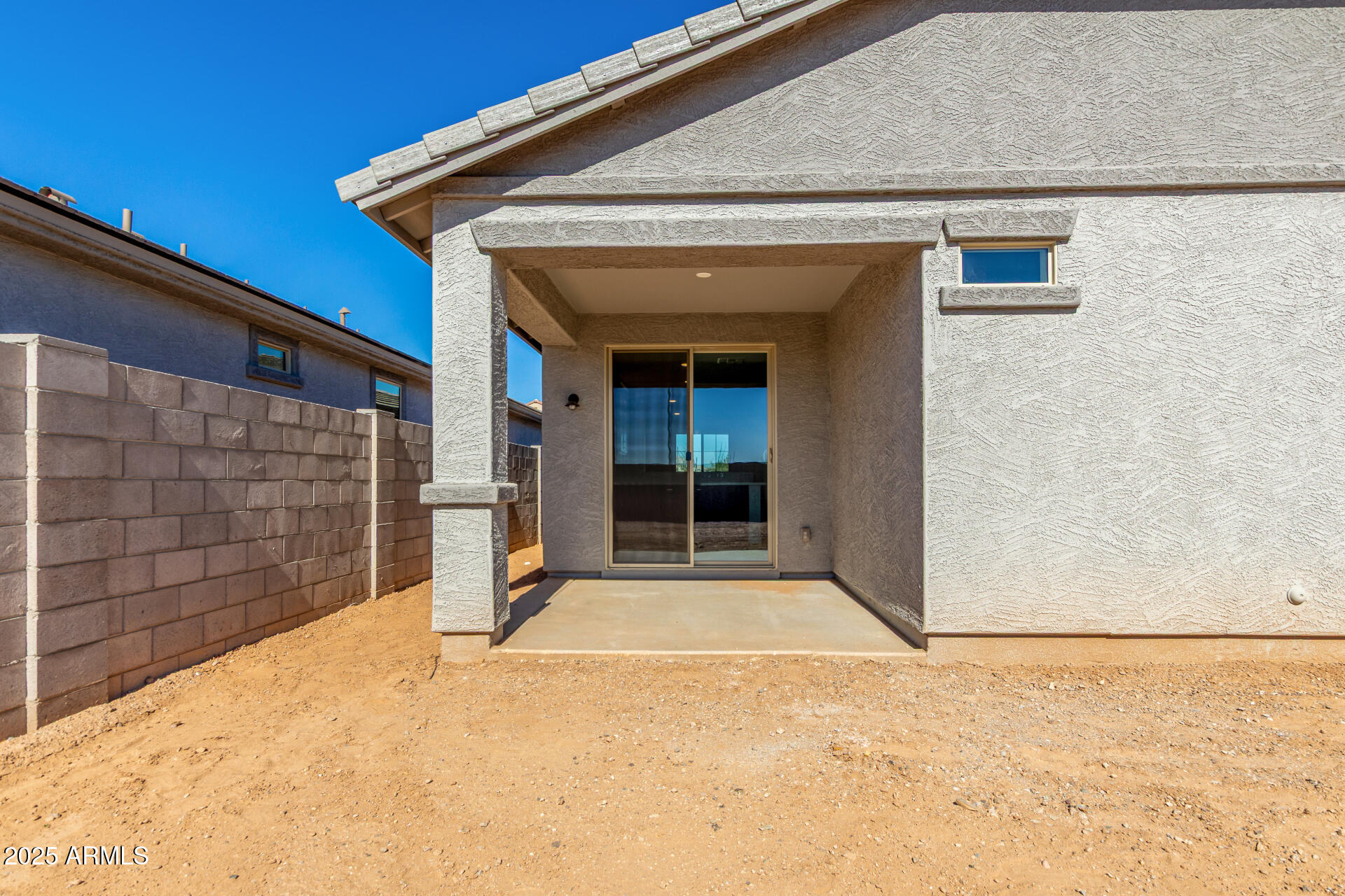 16977 West Spur Drive Surprise, AZ 85387 - Photo 25 of 30 a front view of a house with a yard