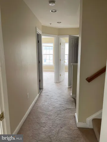 a view of a room with a hallway