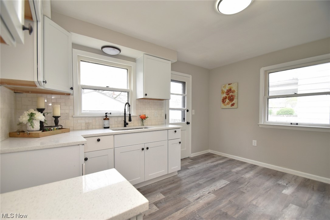 21307 Libby Road Maple Heights, OH 44137 - Photo 9 of 31 Kitchen w/ New Cabinets and LVT Floor
