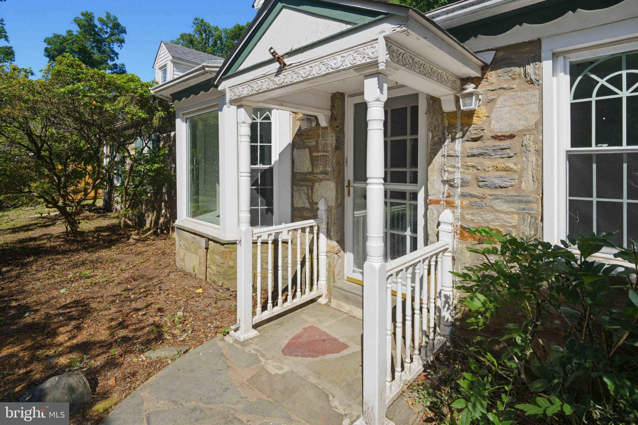 1268 Rydal Road Jenkintown, PA 19046 - Photo 4 of 31 front view of a house with a small yard