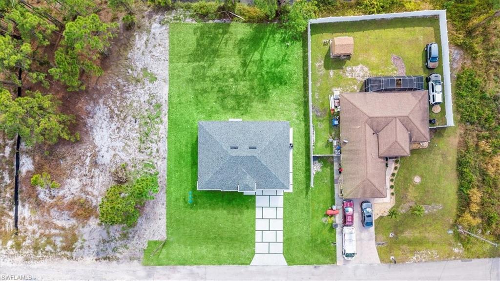 926 Winters Street East Lehigh Acres, FL 33974 - Photo 36 of 36 an aerial view of a house