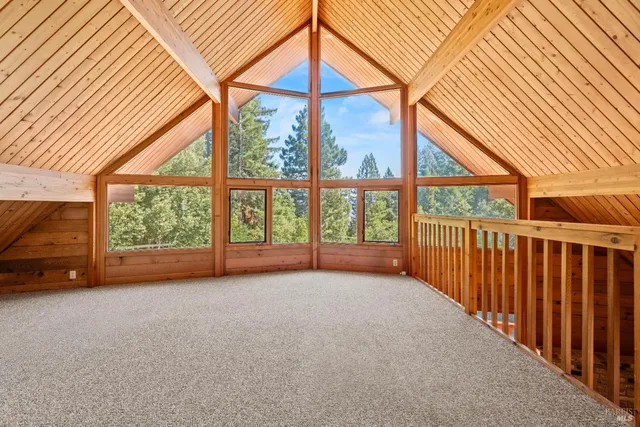 a view of a room with a large window