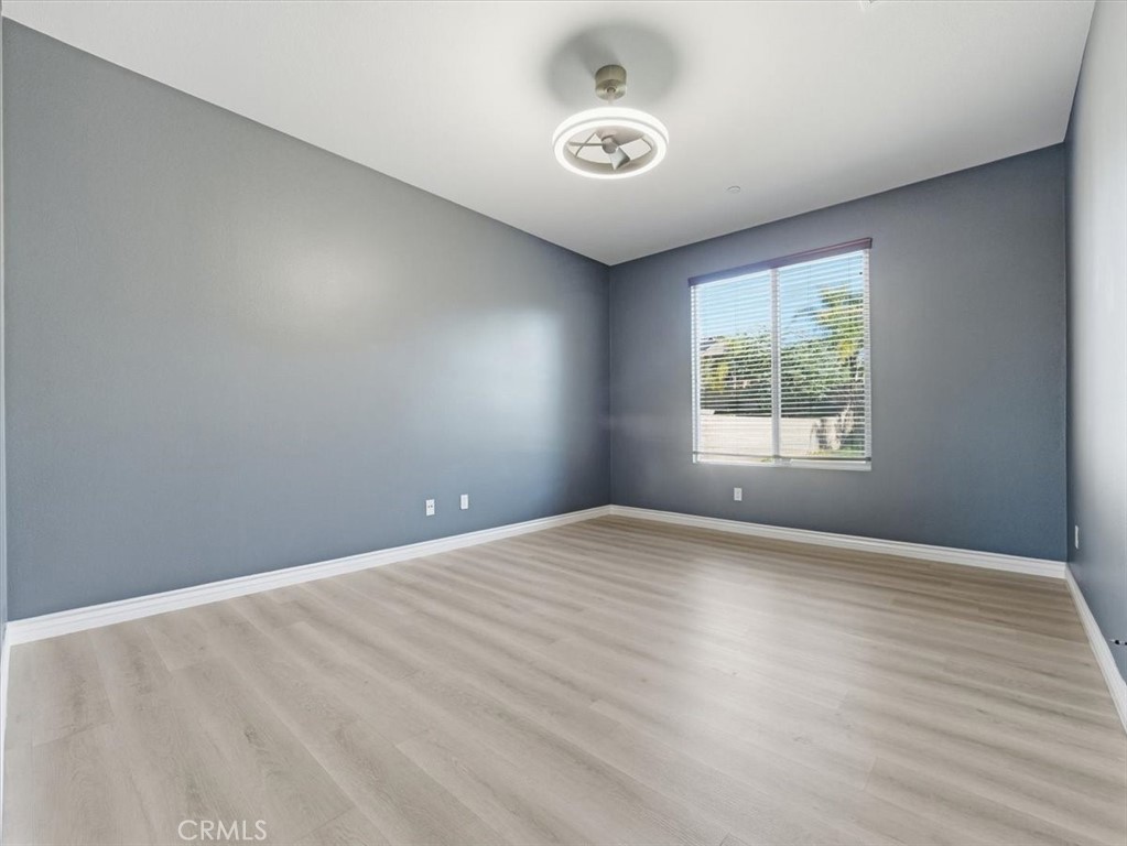 2947 Gilbert Avenue Corona, CA 92881 - Photo 40 of 60 an empty room with windows