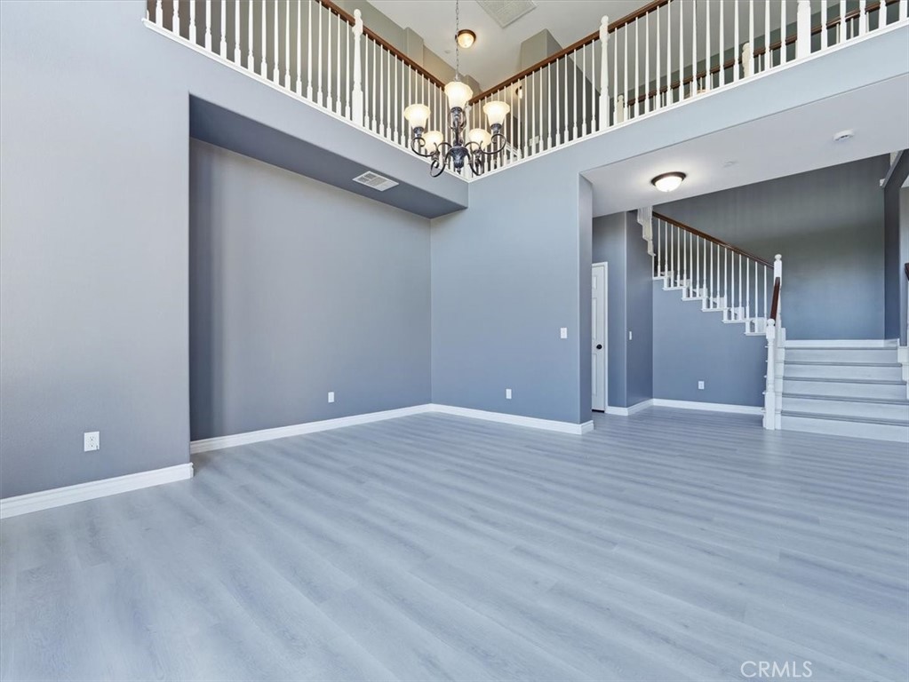 2947 Gilbert Avenue Corona, CA 92881 - Photo 8 of 60 a view of an entryway with wooden floor