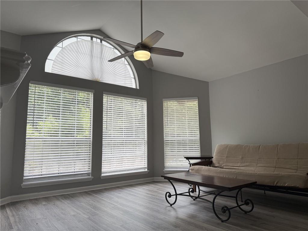 105 Hawkstone Way Alpharetta, GA 30022 - Photo 8 of 23 a view of a workspace with furniture and a window