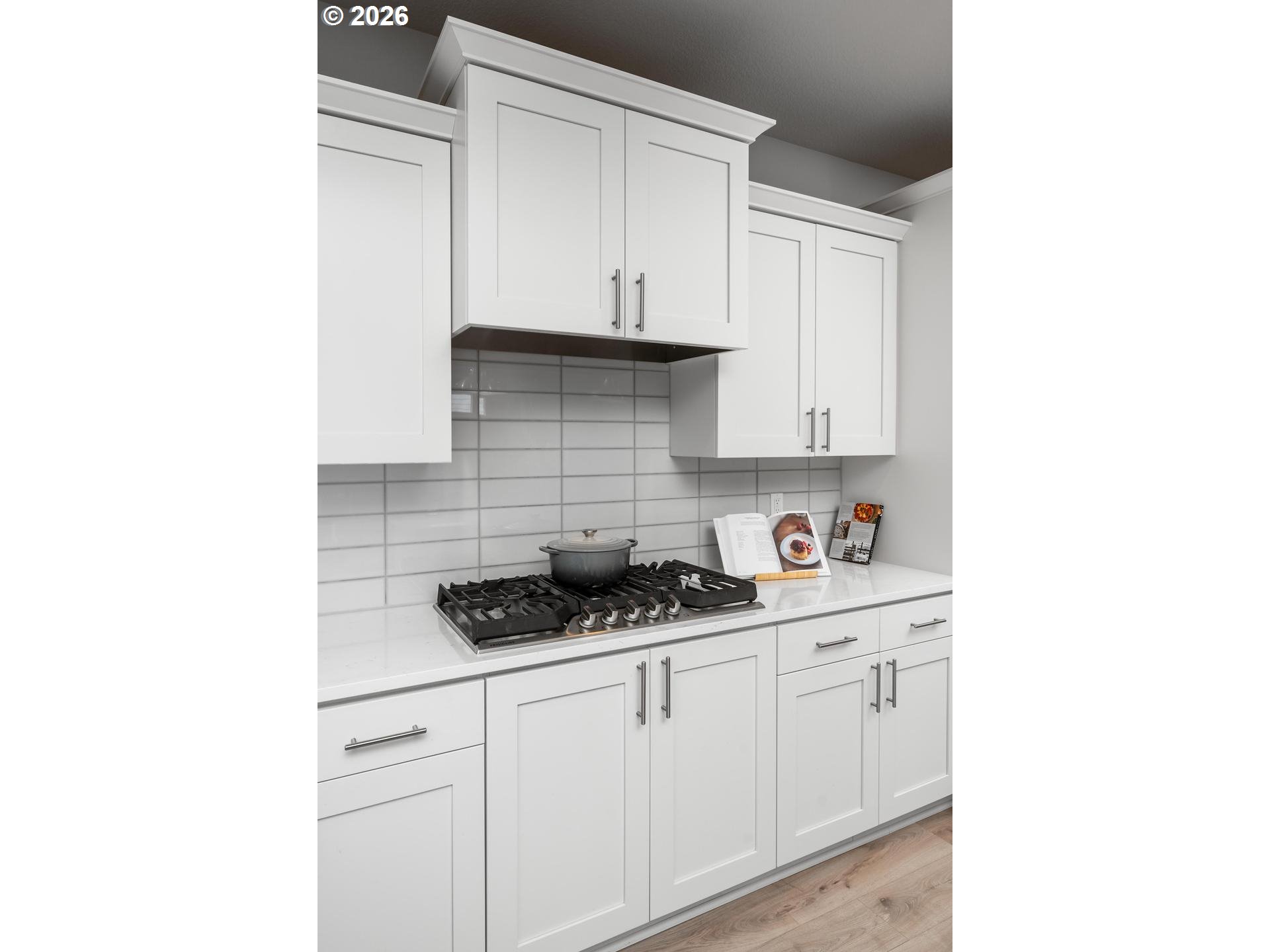 5489 North 91st Avenue Camas, WA 98607 - Photo 15 of 44 a kitchen with stainless steel appliances granite countertop white cabinets and a sink