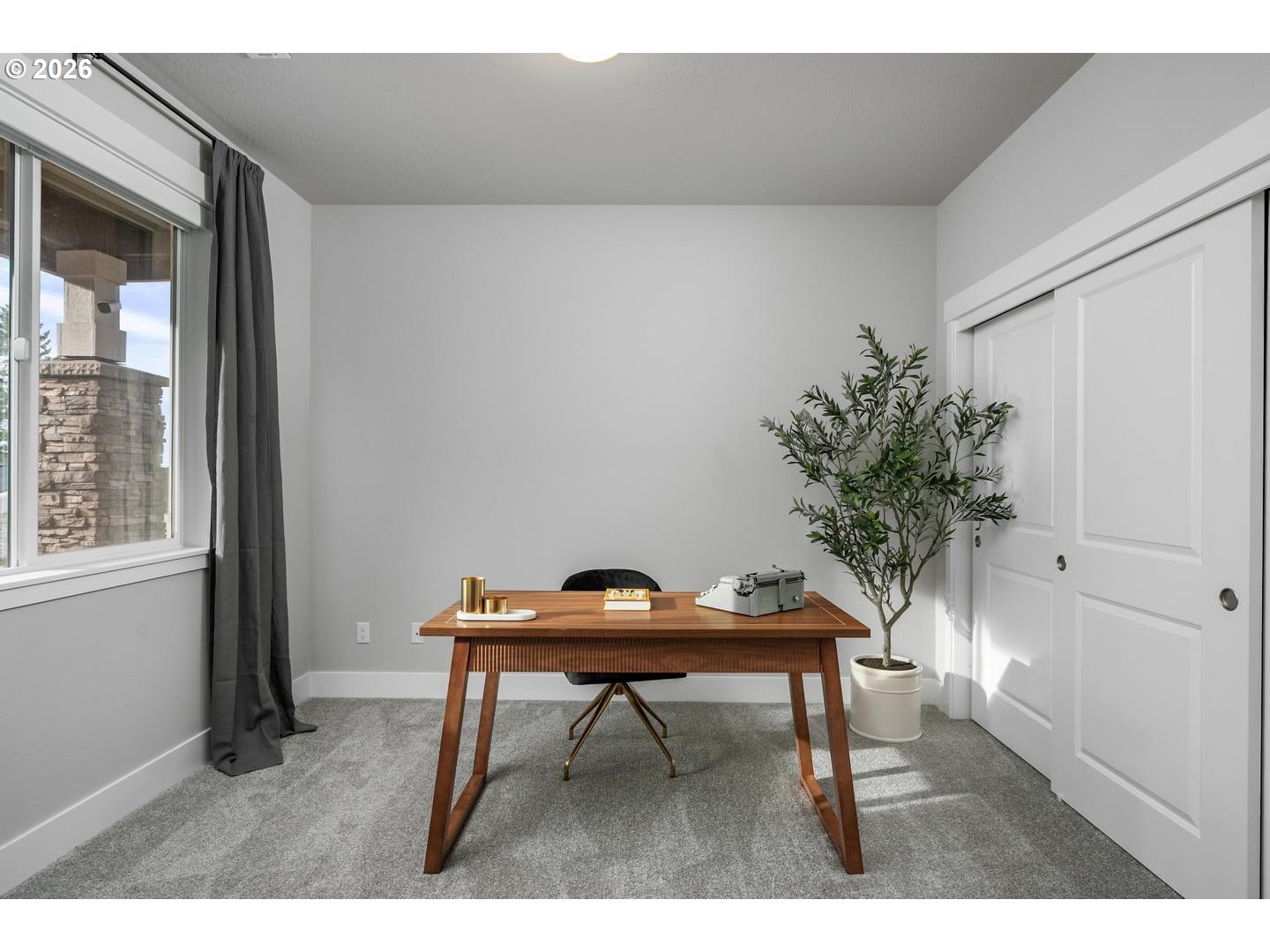 5489 North 91st Avenue Camas, WA 98607 - Photo 19 of 44 a workspace with furniture and a potted plant