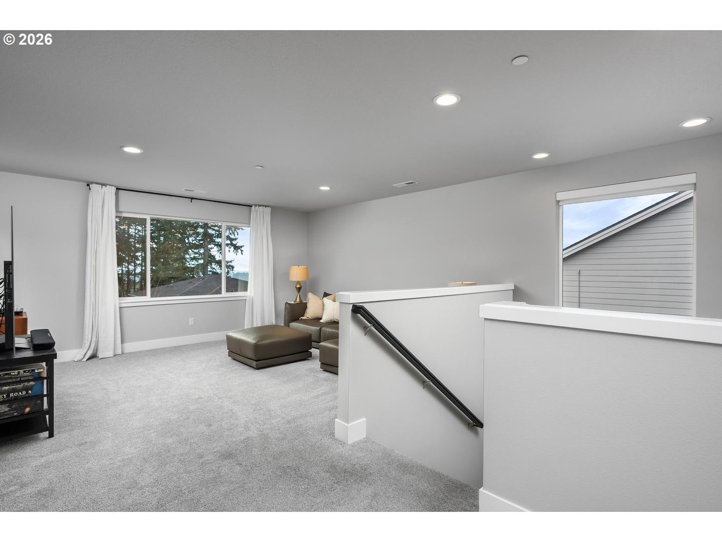 5489 North 91st Avenue Camas, WA 98607 - Photo 22 of 44 a living room with furniture and a large window