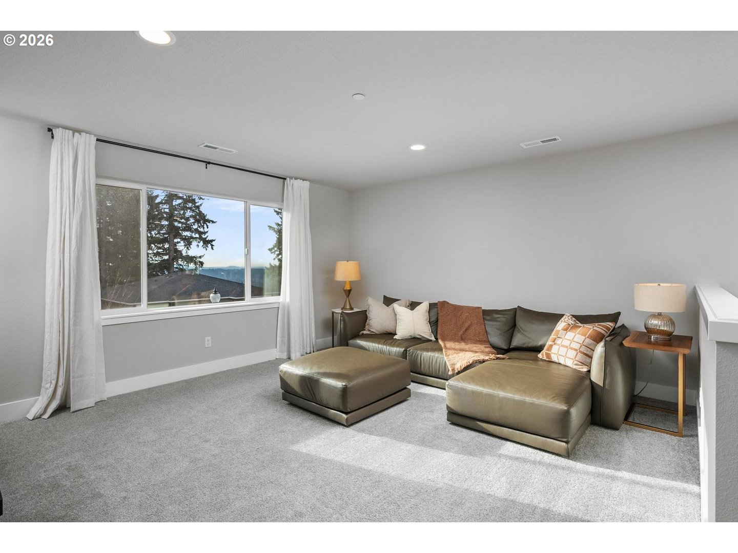 5489 North 91st Avenue Camas, WA 98607 - Photo 23 of 44 a living room with furniture and a large window