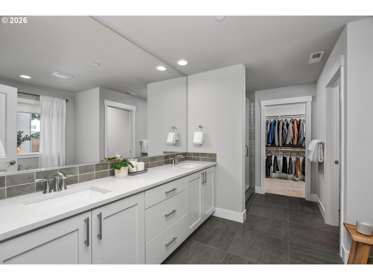 5489 North 91st Avenue Camas, WA 98607 - Photo 29 of 44 a bathroom with a double vanity sink and a