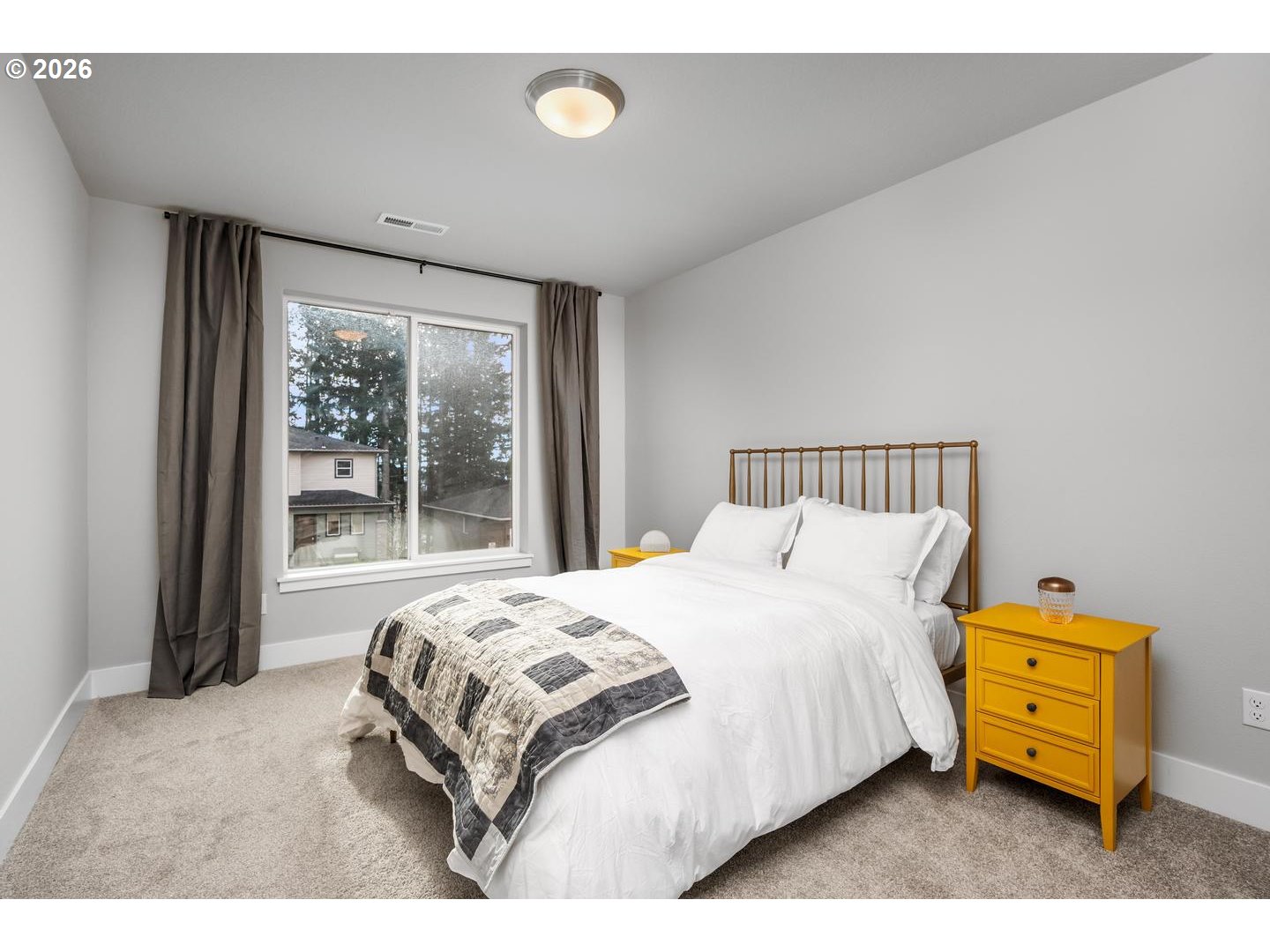 5489 North 91st Avenue Camas, WA 98607 - Photo 32 of 44 a bedroom with a bed and wooden floor