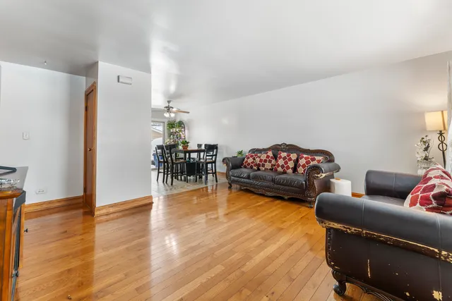 a living room with furniture and a table