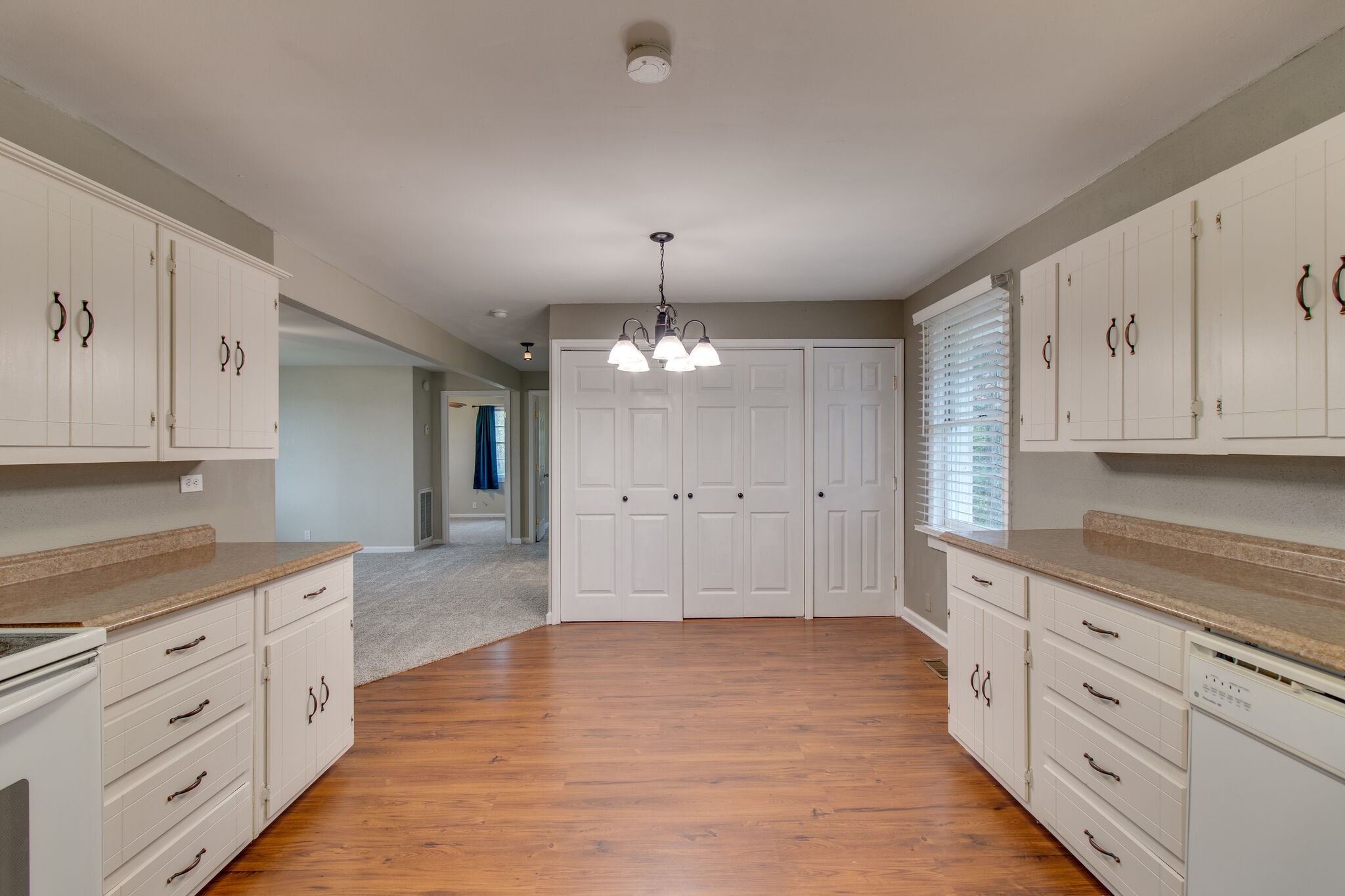 4942 Kedron Road Columbia, TN 38401 - Photo 11 of 17 a view of a kitchen with cabinets and wooden floor