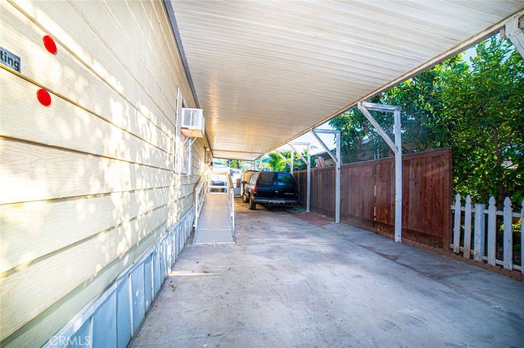 3883 Buchanan Street, Unit 67 Riverside, CA 92503 - Photo 2 of 21 Car port with Mobility Ramp