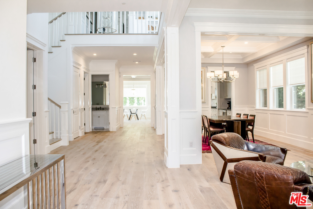 15714 Morrison Street Encino, CA 91436 - Photo 11 of 49 a living room with furniture and a table