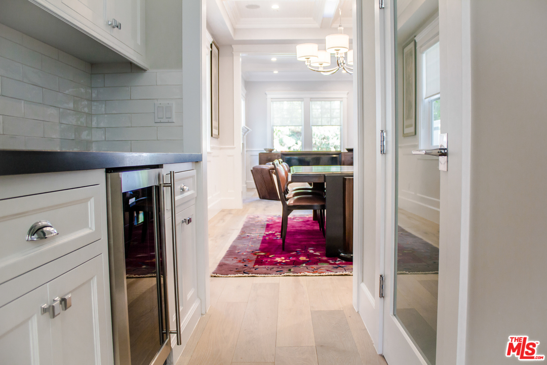 15714 Morrison Street Encino, CA 91436 - Photo 17 of 49 a view of a gallery with wooden floor