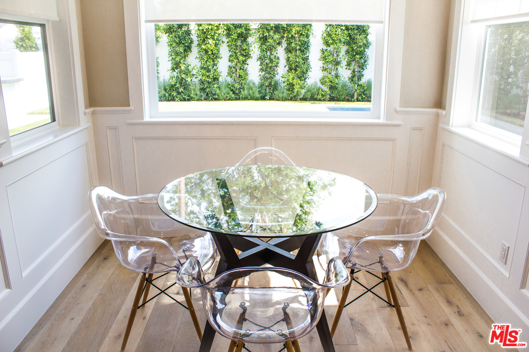 15714 Morrison Street Encino, CA 91436 - Photo 24 of 49 a view of a dining room with furniture and a window
