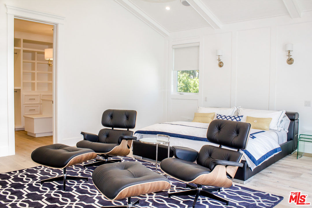 15714 Morrison Street Encino, CA 91436 - Photo 35 of 49 a living room with furniture and a window