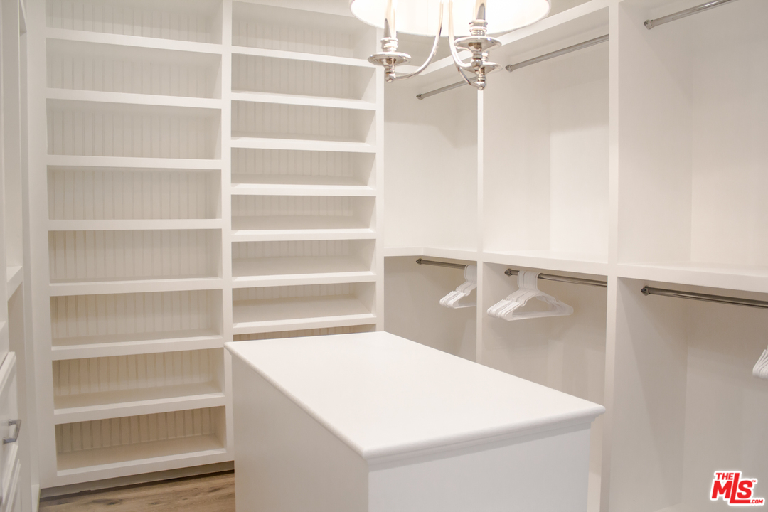 15714 Morrison Street Encino, CA 91436 - Photo 36 of 49 a view of an empty walk in closet