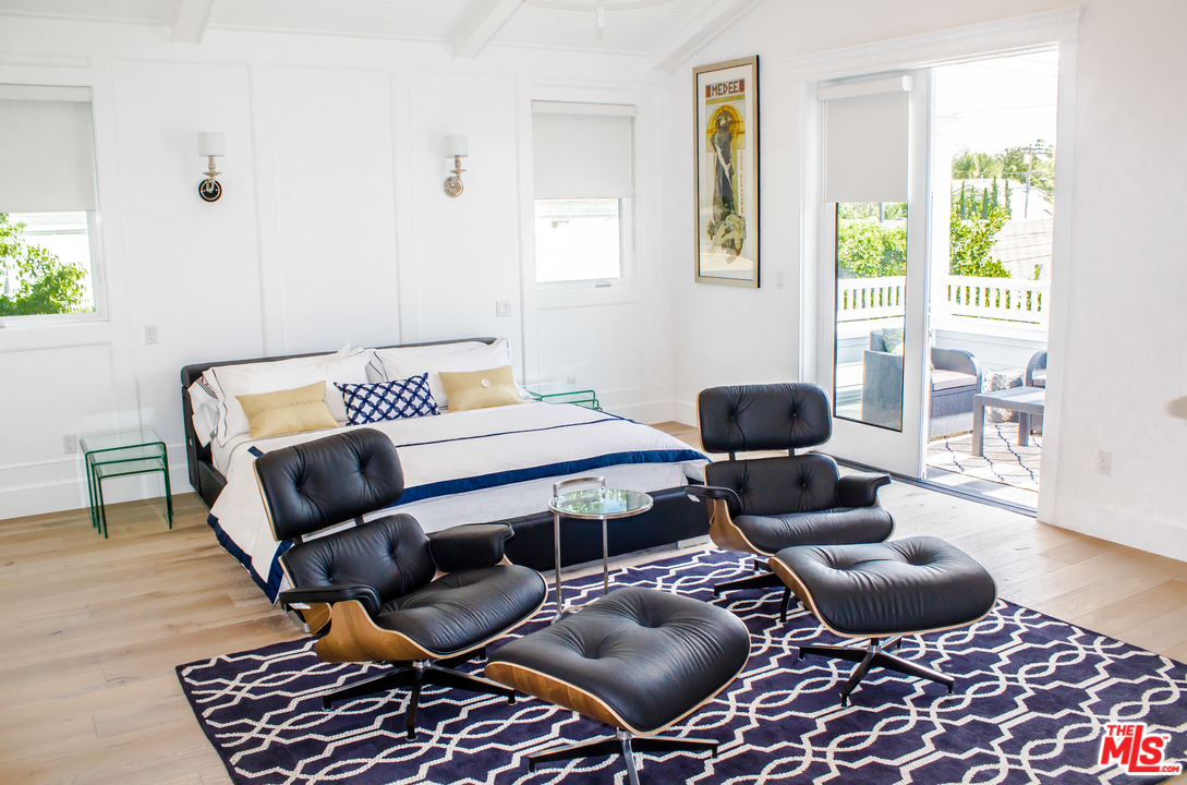 15714 Morrison Street Encino, CA 91436 - Photo 8 of 49 a living room with furniture and a rug