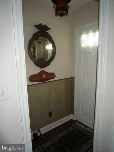 634 Murdock Road Baltimore, MD 21212 - Photo 12 of 23 a view of a livingroom and a mirror