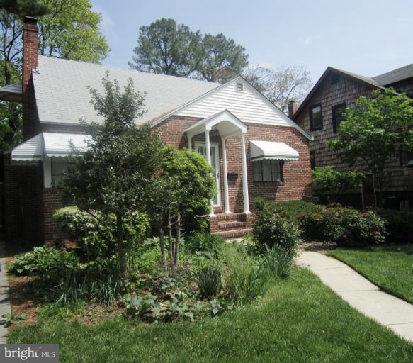 634 Murdock Road Baltimore, MD 21212 - Photo 22 of 23 a view of a white house with a yard and potted plants