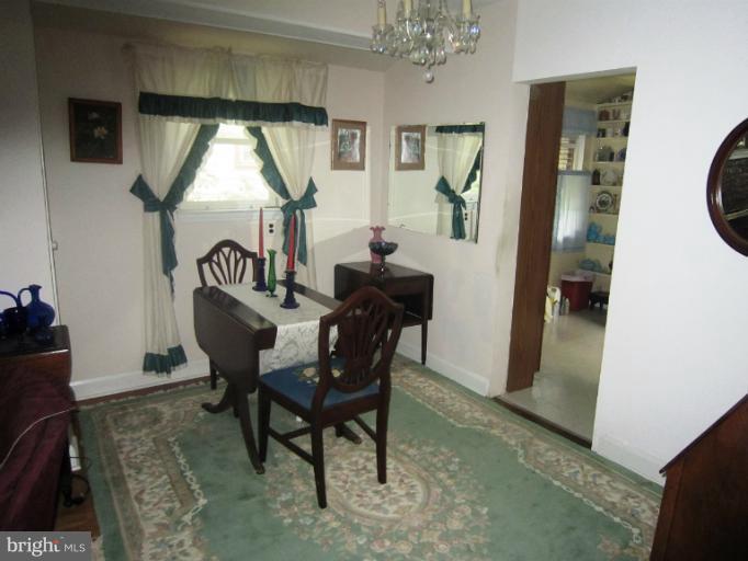 634 Murdock Road Baltimore, MD 21212 - Photo 5 of 23 a view of a dining room with furniture and window