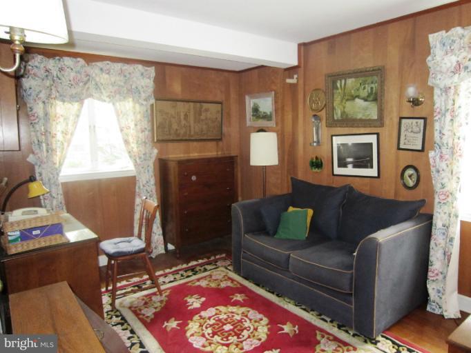 634 Murdock Road Baltimore, MD 21212 - Photo 9 of 23 a living room with furniture and a window
